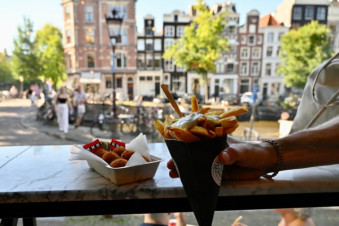 10 Tastes of Amsterdam: Food Tour by UNESCO Canals and Jordaan - Chocolate at Puccini Bomboni and a University Snack Stop