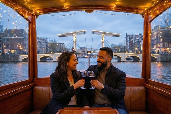 Amsterdam 1-Hour Canal Cruise With Live Guide - Jordaan on the water: romantic bridges, boutiques, and local life