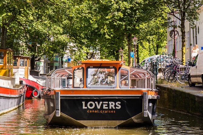 Amsterdam 1h Canal Cruise by Semi-Open Boat with Audio Guide - Magere Brug and Classic Bridge Lines: Why Bridges Matter Here