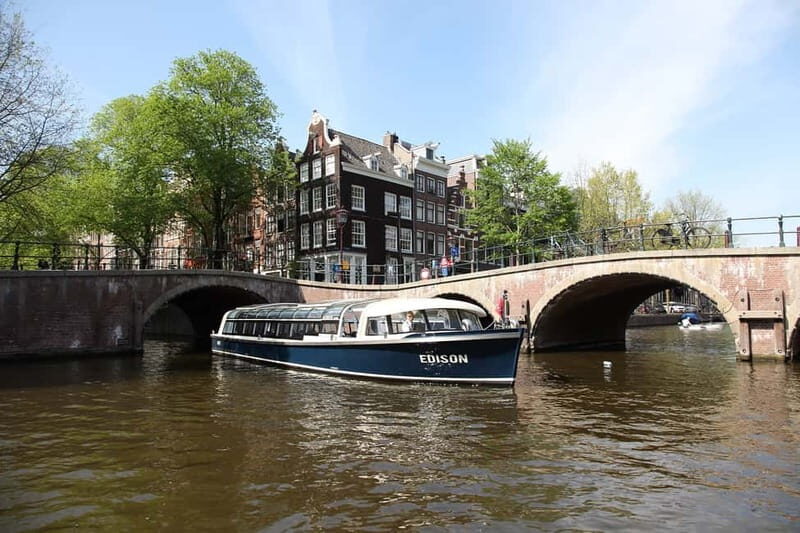 Amsterdam: 75 Minute City Canal Cruise with Audio Guide - Boarding flow: what to expect with tickets and getting seated