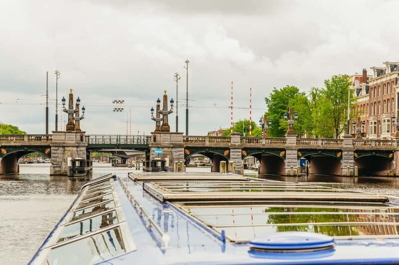 Amsterdam: 75 Minute City Canal Cruise with Audio Guide - Route highlights you’ll recognize fast: Anne Frank area, Westerkerk, and the UNESCO canal belt