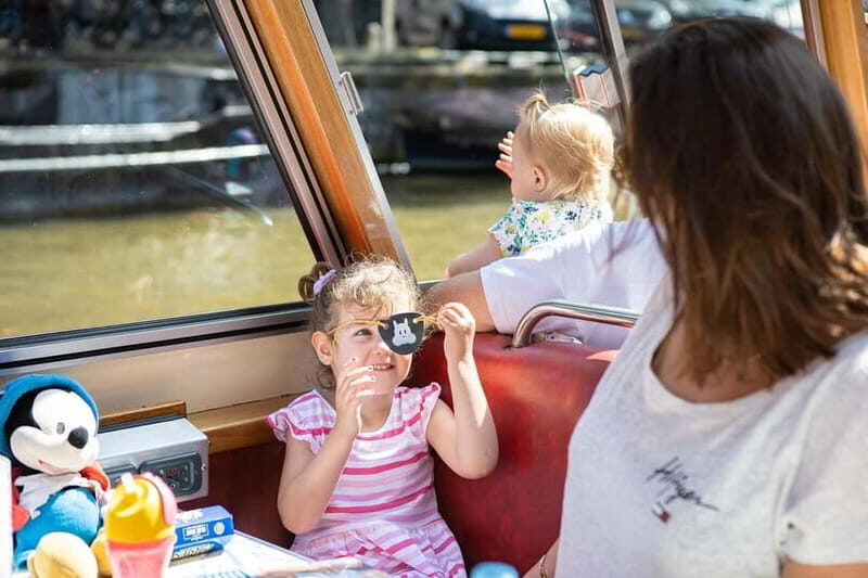 Amsterdam: 75 Minute City Canal Cruise with Audio Guide - Comfort and snacks: small extras that make the cruise feel worth the ticket