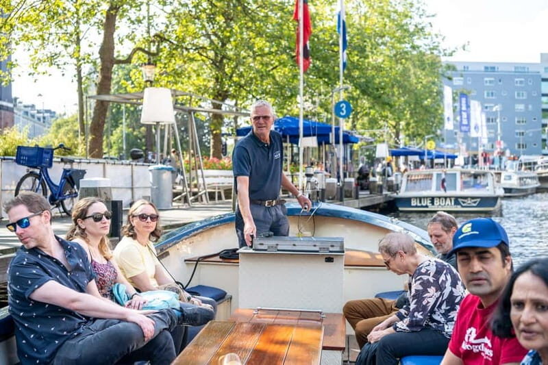 Amsterdam: 75 minute Open Boat Canal Cruise with Live Guide - Meet the Blue Boat Company dock on Stadhouderskade