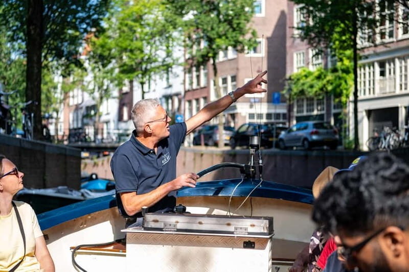Amsterdam: 75 minute Open Boat Canal Cruise with Live Guide - Why the live captain matters more than the sightseeing list