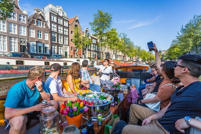 Amsterdam All-Inclusive 90-Minutes Heated Cruise by Captain Jack - Famous Landmarks From the Water: Anne Frank Area, Churches, and Bridges