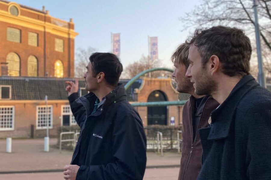 Amsterdam: Anne Frank Guided Small Group Walking Tour - Blauwburgwal: connecting canals and consequences