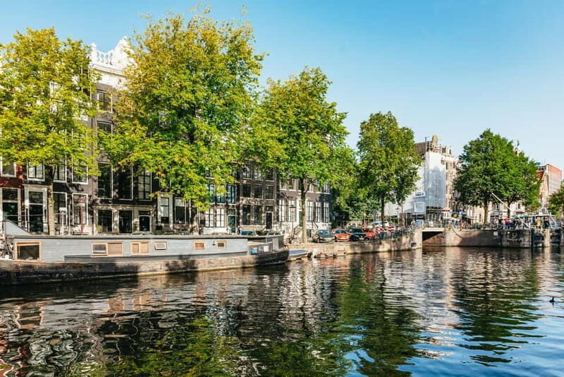 Amsterdam: Bike Tour with Optional Cruise in Small-Group - Windmill de Gooyer and Magere Brug: the photo stops that feel real