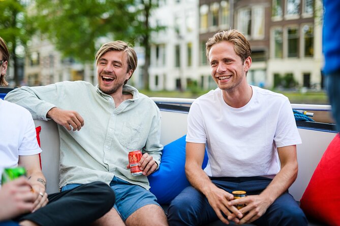 Amsterdam: Canal Booze Cruise with Unlimited Drinks Option - The Boat, the Crew, and Weather: What You Should Plan For