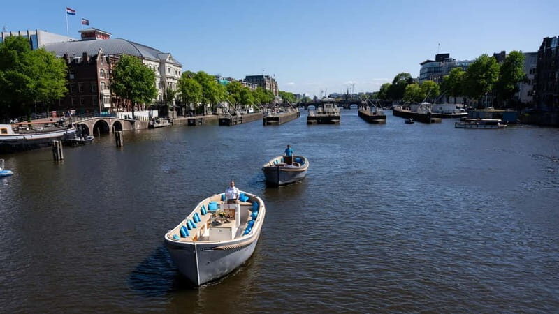 Amsterdam: Canal Cruise in Open Boat with Drink Option - Key takeaways