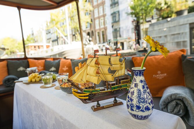Amsterdam Canal Cruise with Cheese and Wine - The guide experience: humor, facts, and personalities