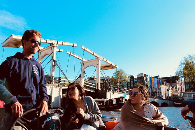 Amsterdam Canal Tour by Open Boat – 90 min Small Group Experience - Meeting point and timing: arriving like a pro