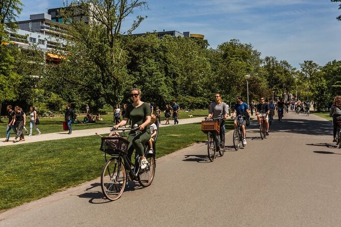 Amsterdam City Highlights and Hidden Gems - Private & Custom Tour - Central square time: bookstores, cafés, and quiet passageways