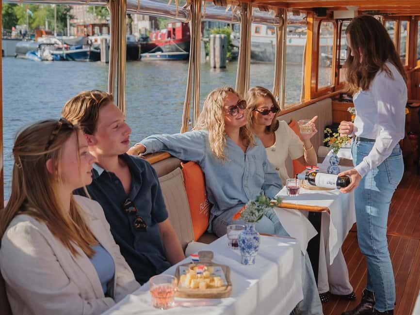 Amsterdam: Classic Boat Cruise with Optional Cheese & Wine - Golden Age canals, Golden Bend, and Maritime Museum angles