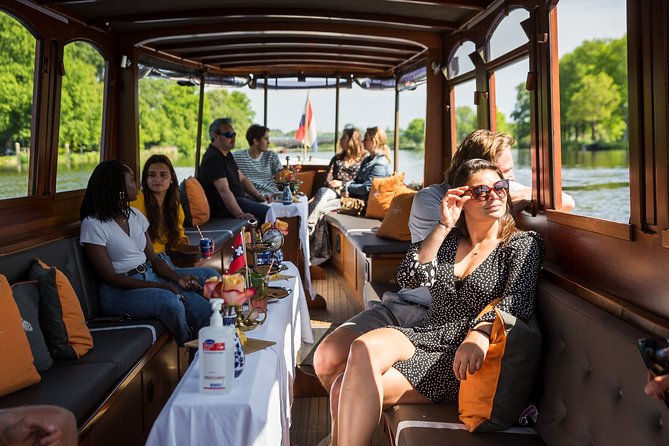 Amsterdam Classic Saloon Boat Cruise with Drinks and Cheese - Crowds, Sound, and Seating: When This Cruise Is Calm vs Chaotic