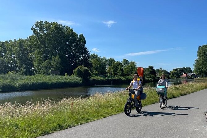 Amsterdam Countryside Bike and Kayak Tour - Kanaaldijk cable ferry: the short break that feels like a storybook shortcut