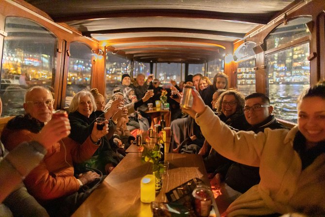 Amsterdam Evening Canal Cruise with Live Guide and Onboard Bar - The Real-Life Comfort Factors: Cold, Rain, and Crowding