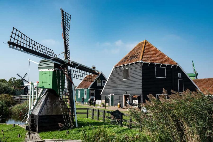 Amsterdam: Explore Zaanse Schans: Half-Day Luxury Coach Trip - Exploring Zaanse Schans on foot: windmills with context