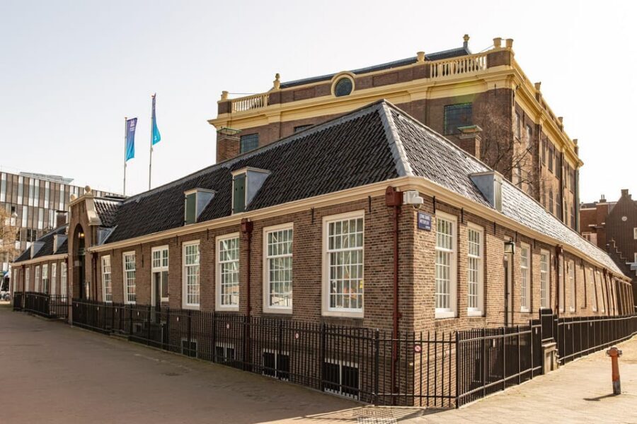 Amsterdam: Guided Anne Frank Small-Group Walking Tour - Wertheimpark’s Auschwitz Memorial and the broken-mirror symbolism