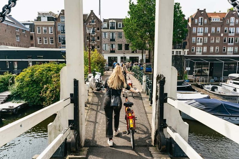 Amsterdam: Guided Bike Tour City Centre in EN/DE/FR/ES - Key takeaways before you book