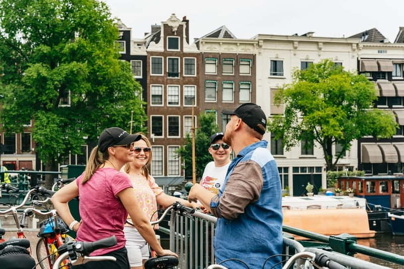 Amsterdam: Guided Bike Tour City Centre in EN/DE/FR/ES - Starting with Central Station energy and A’DAM Tower