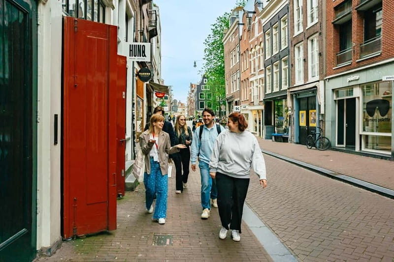 Amsterdam: Guided Cultural Walking Tour - Beurs van Berlage and Magna Plaza: From Trading Floors to Modern Foot Traffic
