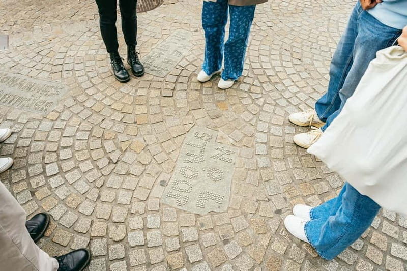 Amsterdam: Guided Cultural Walking Tour - Multatuli Statue, a Tiny House Detail, and Torensluis Bridge: Small Clues With Big Stories