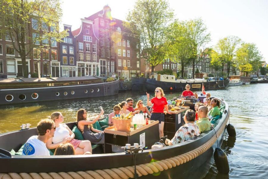 Amsterdam: Guided Open Boat Canal Cruise Including Drink - Key things I think you’ll notice right away