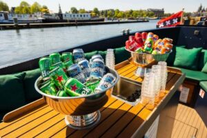 Amsterdam: Guided Open Boat Canal Cruise Including Drink - Meeting at Central Station without losing your time
