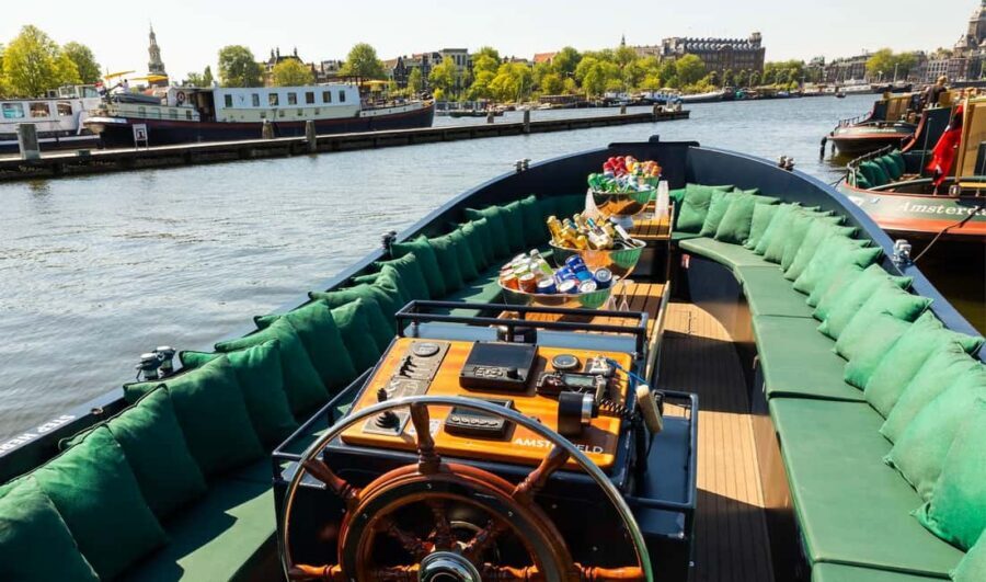 Amsterdam: Guided Open Boat Canal Cruise Including Drink - Included drink vs unlimited drinks: when the open bar is a smart add-on
