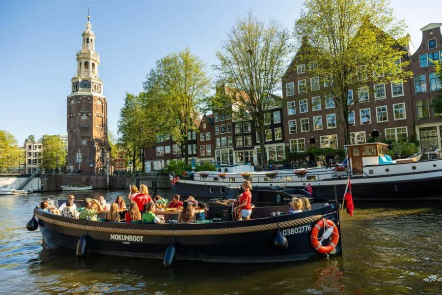 Amsterdam: Guided Open Boat Canal Cruise Including Drink - Best fit for your travel style (and who should skip it)