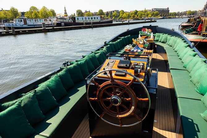 Amsterdam: Guided Open Boat Canal Cruise Unlimited Drinks Option - A fast canal route that still feels like Amsterdam