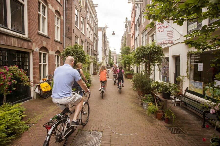 Amsterdam: Hidden Gems & Highlights Guided Bike Tour - Safety and comfort: what to watch for on Amsterdam bikes