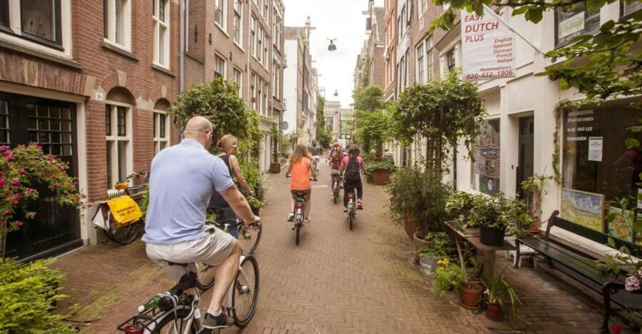 Amsterdam: Hidden Gems & Highlights Guided Bike Tour - Getting rolling: bikes, meeting spot, and the group pace