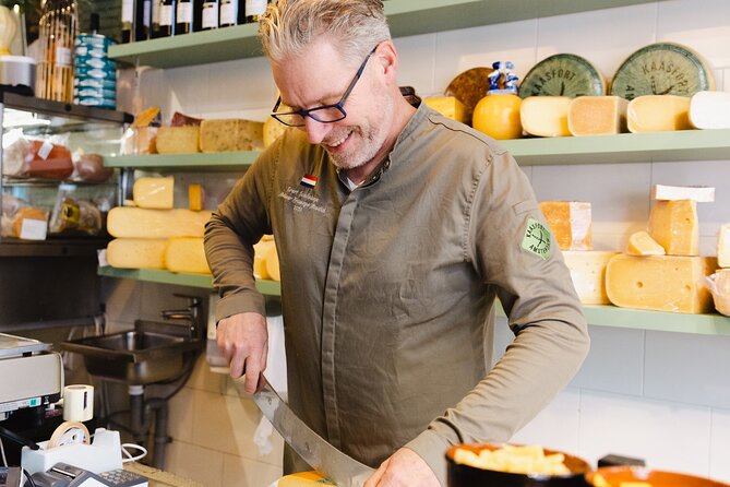 Amsterdam High-End Dutch Food & History Tour - Up to 8 guests - Indonesian Dutch-Crossroads Flavors: Satay, Peanut Sauce, and Spekkoek