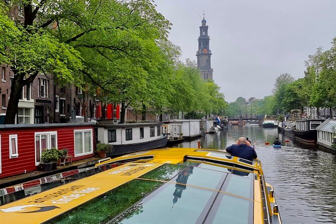 Amsterdam: Historic City Sightseeing Canal Cruise - Melkmeisjesbrug: the milk market bridge with centuries behind it