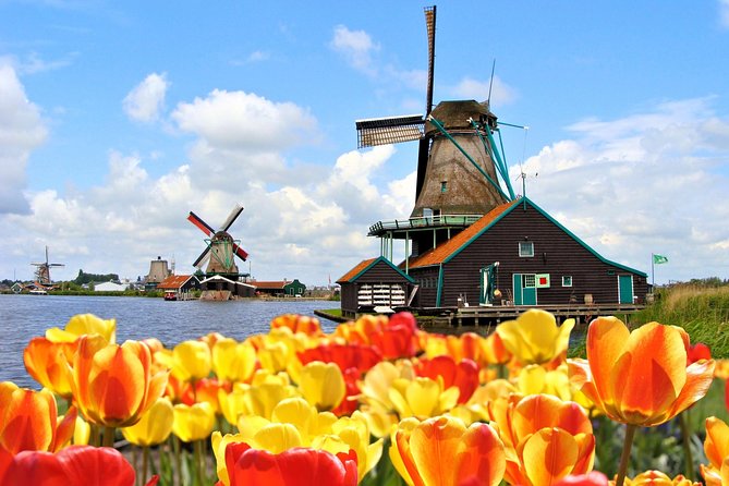 Amsterdam: Keukenhof and Zaanse Schans Windmills Guided Day Trip - Zaanse Schans windmills: working mills, old buildings, and craft time