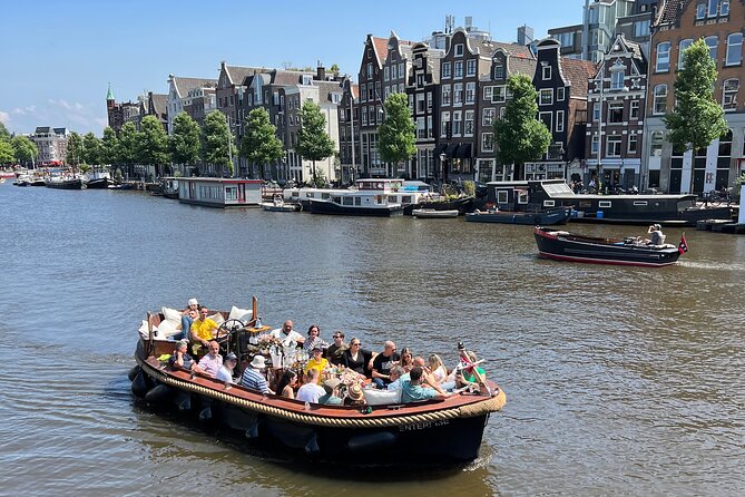 Amsterdam Luxury Boutique Boat tour with Unlimited Beer and Wine - Where You Start: The Oudezijds Voorburgwal Canal Stop
