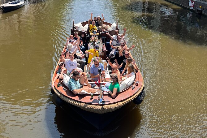 Amsterdam Luxury Boutique Boat tour with Unlimited Beer and Wine - Oude Kerk: Oldest Parish Church, Modern Use Nearby