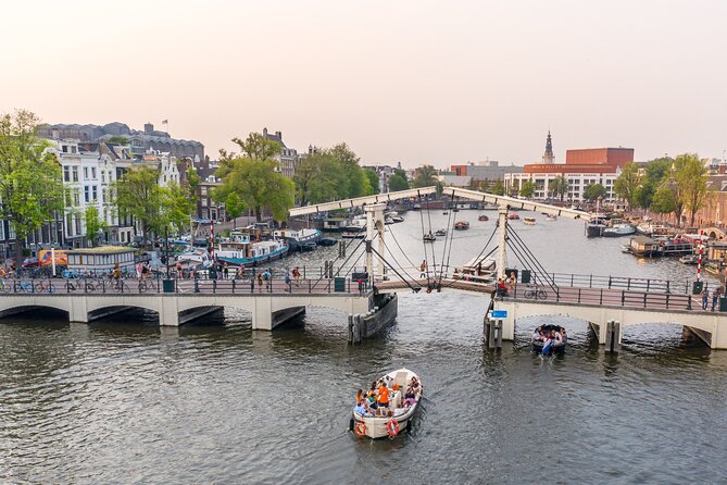 Amsterdam Luxury Canal Cruise + Unlimited Drinks & Bites option - Getting On the Boat: Simple, but Plan for One Step Up