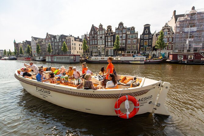 Amsterdam Luxury Canal Cruise + Unlimited Drinks & Bites option - What Each Landmark Teaches You About Amsterdam (and What Can Go Wrong)
