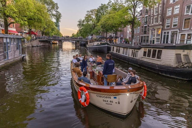 Amsterdam: Luxury Canal Cruise with Optional Snacks & Drinks - Oudenschans and the Dancing Houses: Bridges, Quirks, and City Charm