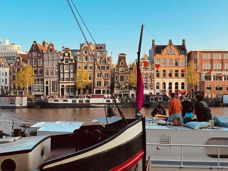 Amsterdam: Off the Beaten Path Bike Tour in French - Entering Amsterdam’s quieter side by bike
