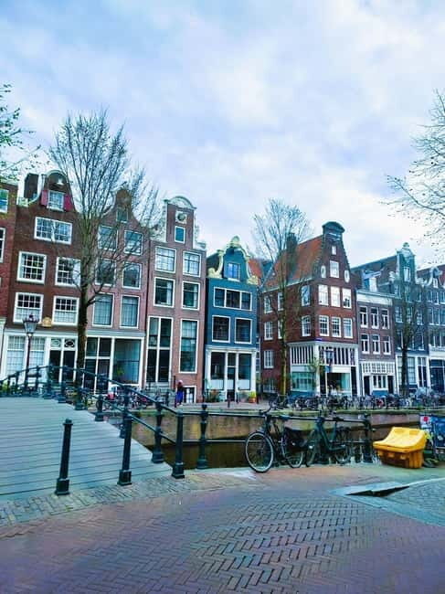 Amsterdam: Off the Beaten Path Bike Tour in French - Magere Brug, Amstelveld, and Reguliersgracht: the classic bridge finish