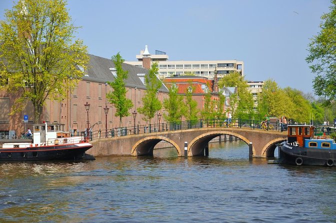 Amsterdam Open Boat Cruise with Live Guide and Two Drinks - Key things to know before you go