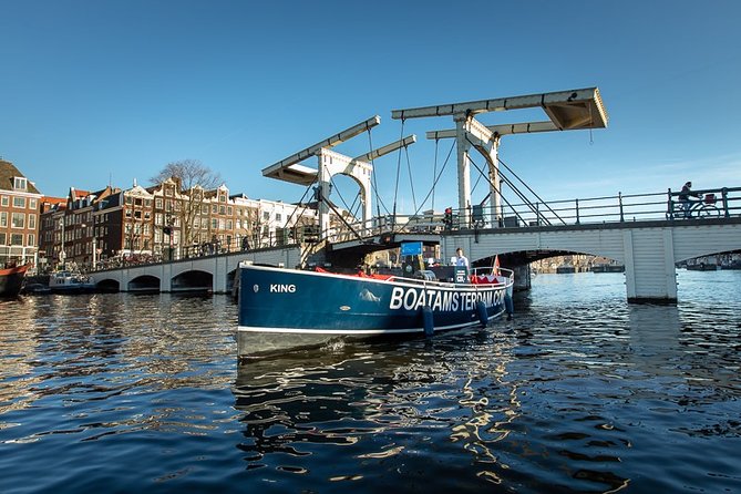 Amsterdam Open Boat Cruise with Live Guide and Two Drinks - Entering The Canal System From the Hermitage Side