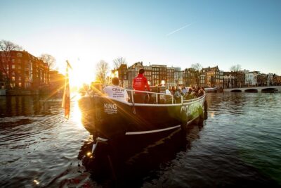 Amsterdam Open Boat Cruise with Live Guide and Two Drinks - Finding Amstel 51F and Boarding Without Stress