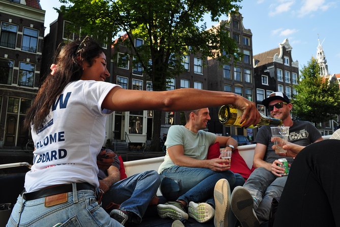 Amsterdam Open Boat Cruise with Live Guide and Two Drinks - Skinny Bridge, the Jordaan, and Why Names Matter