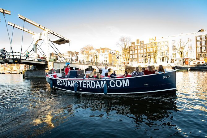 Amsterdam Open Boat Cruise with Live Guide and Two Drinks - Anne Frank House Views and How to Read Them