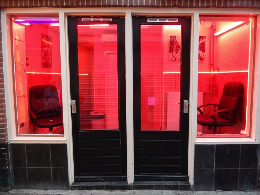 Amsterdam: Red Light District Exclusive Night Tour - Condomerie and Casa Rosso: watching the branding and the symbolism