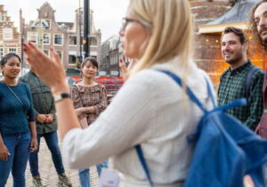 Amsterdam: Red Light District Tour in German/English/Italian - Dam Square Start to Condomerie: Why the Contraception Stop Sets the Tone